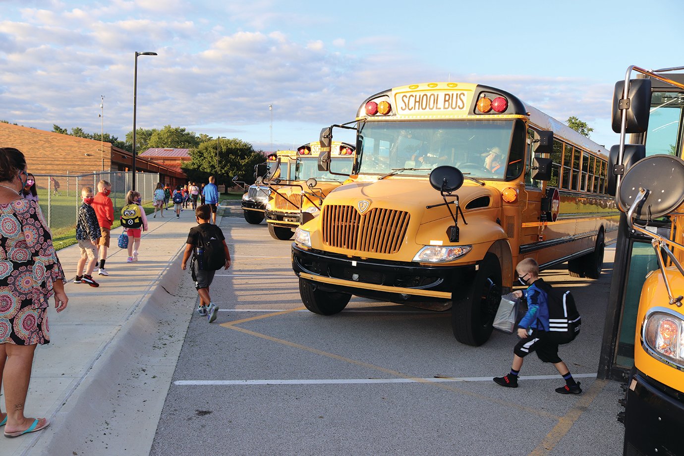 Excited for their first day of school, New Market Elementary students are taken into the building Thursday in groups to promote social distancing.
